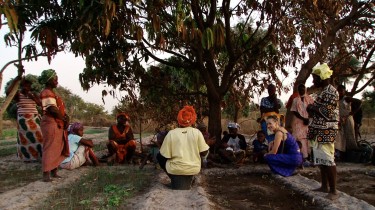 Women gathering in the community garden