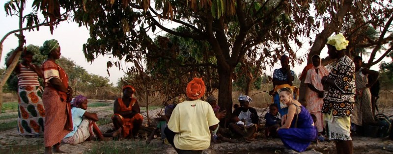 Women gathering in the community garden